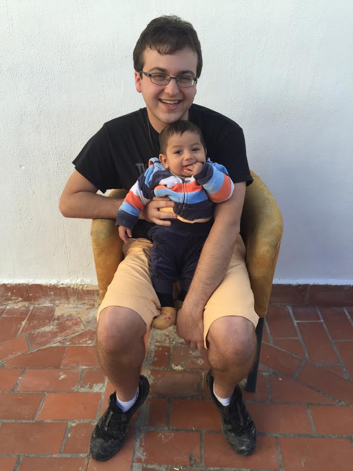 Myself with three month-old Syrian refugee Rambo Hadi, at La Fundación Escuela de Solidaridad, in Granada, Spain. Photo credit to Karen Washington.