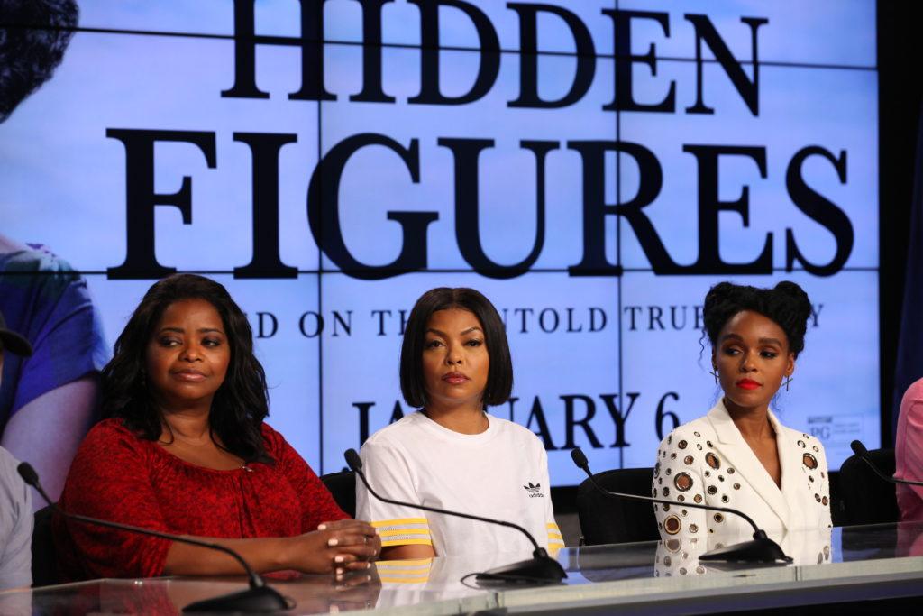 In the Press Site auditorium at the Kennedy Space Center in Florida, members of the media participate in a news conference with key individuals from the upcoming motion picture "Hidden Figures." From the left are: Octavia Spencer, who portrays Dorothy Vaughan; Taraji P. Henson, who portrays Katherine Johnson in the film; and Janelle Monáe, who portrays Mary Jackson. The movie is based on the book of the same title, by Margot Lee Shetterly. It chronicles the lives of Katherine Johnson, Dorothy Vaughan and Mary Jackson, three African-American women who worked for NASA as human "computers.” Their mathematical calculations were crucial to the success of Project Mercury missions including John Glenn’s orbital flight aboard Friendship 7 in 1962. The film is due in theaters in January 2017.