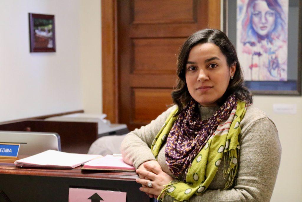 Medina assists anyone who seeks help in the Upper School Office.