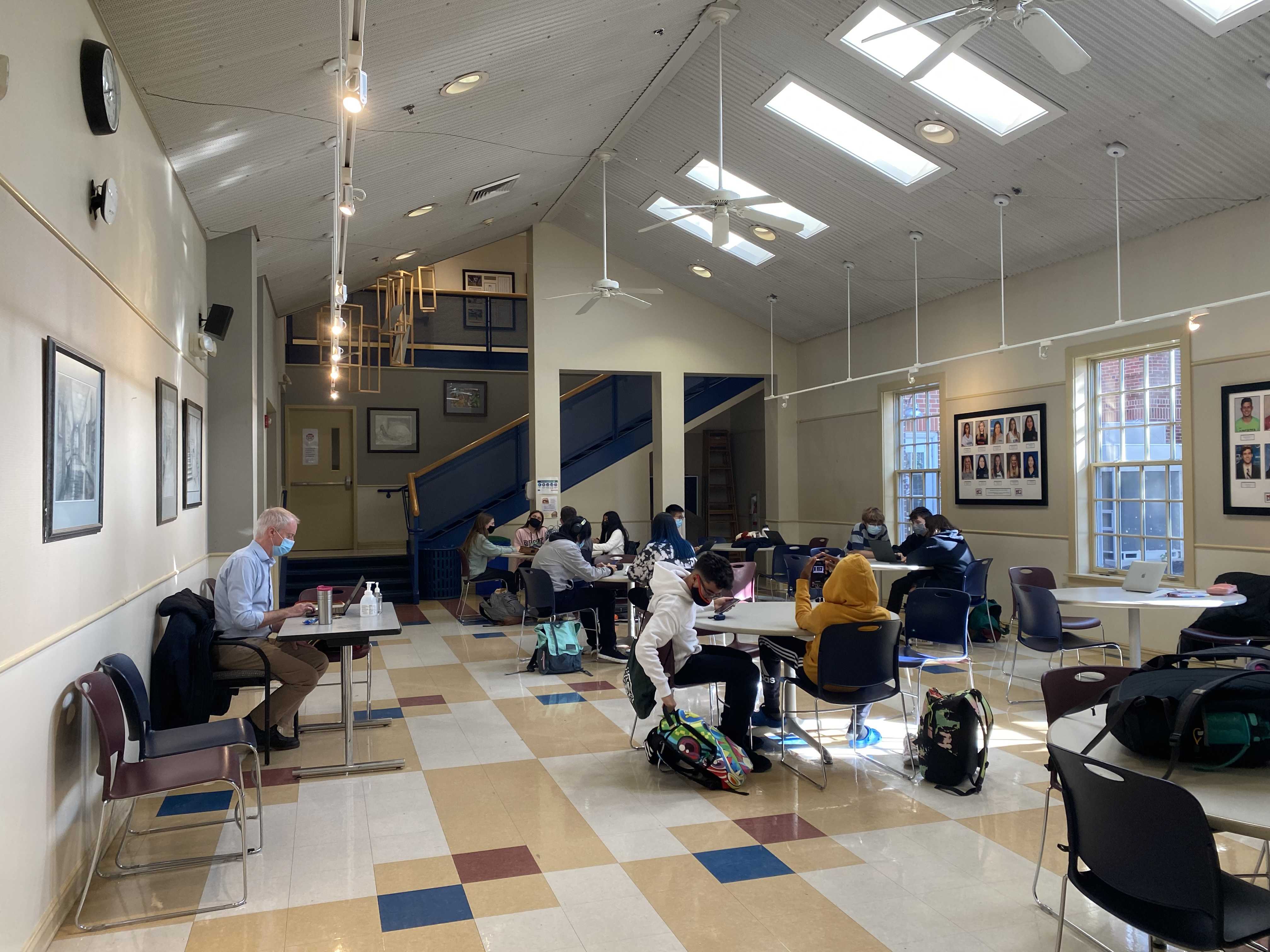 Students enjoying the newly returned tables in the Field House Commons. Photo by Hannah Puc '24.