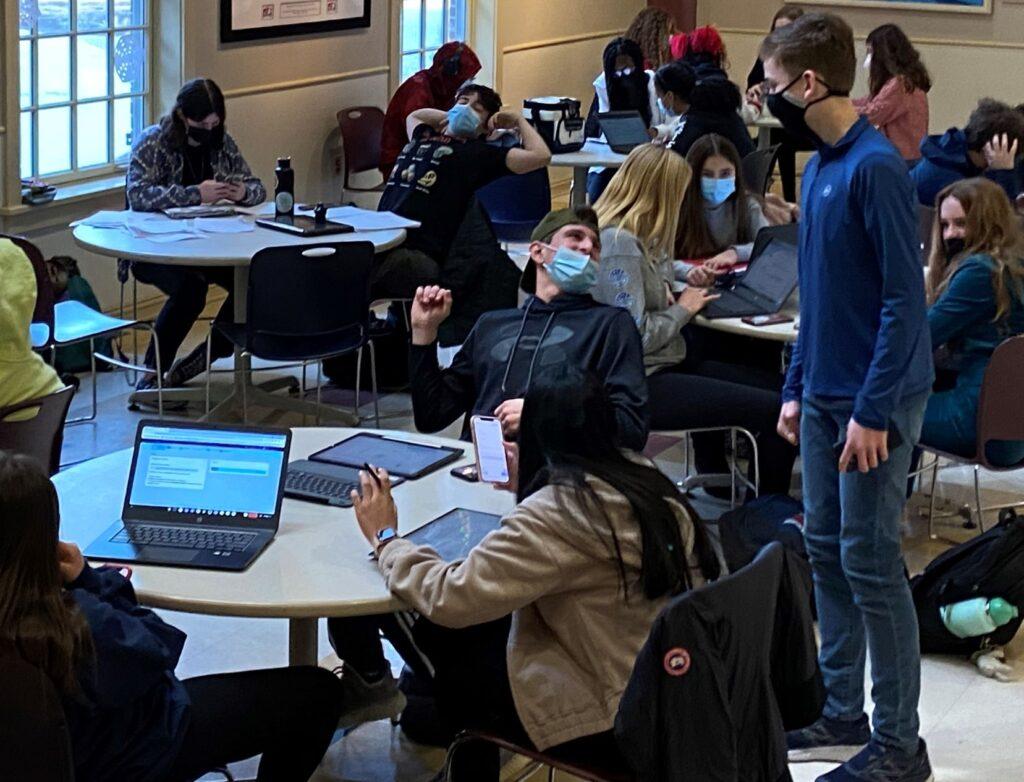 Masked Ninth Grade Students during Study Hall in the Baida Field House Commons. Photo by Luke Iacono ’25. 
