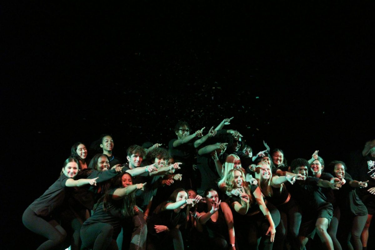 Seniors pose for a picture following their Airband finale. Photo by Emmie Huynh ’27.
