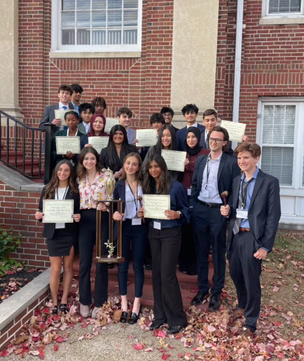 Students posing for a photo with their awards. Photo from Sophia Lalani ’25.
