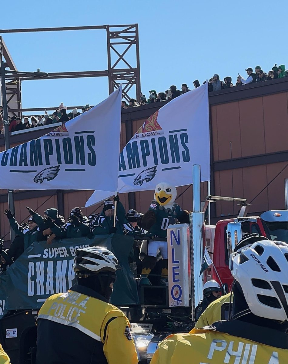 Eagles mascot "Swoop" interacts with fans during parade. Photo by Sophia Lo Re ’26.