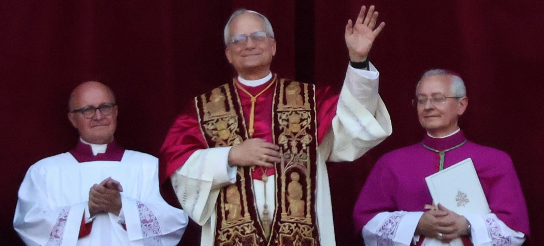 Pope Leo XIV waving to the crowd after being announced as Pope. Photo by Edgar Beltrán on Wikimedia Commons.