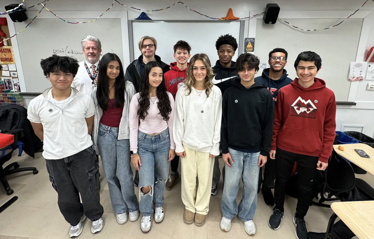MFS’s inaugural Global Certificate Program cohort of 10 students and advisor Larry Ottman. Photo courtesy of Mike Schlotterbeck.