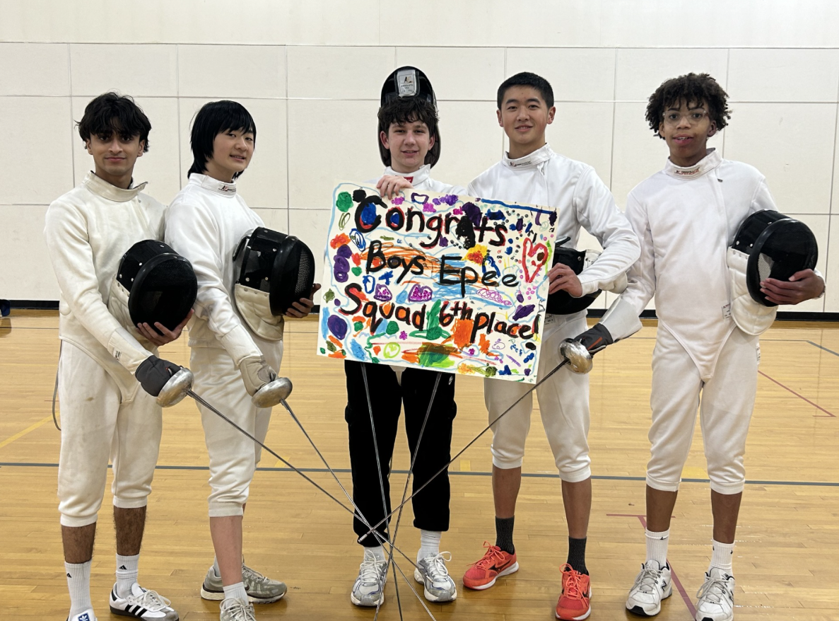 The boys' fencing épée squad posing for their win. Photo by Christina Farrow, MFS Fencing and Cross Country coach.