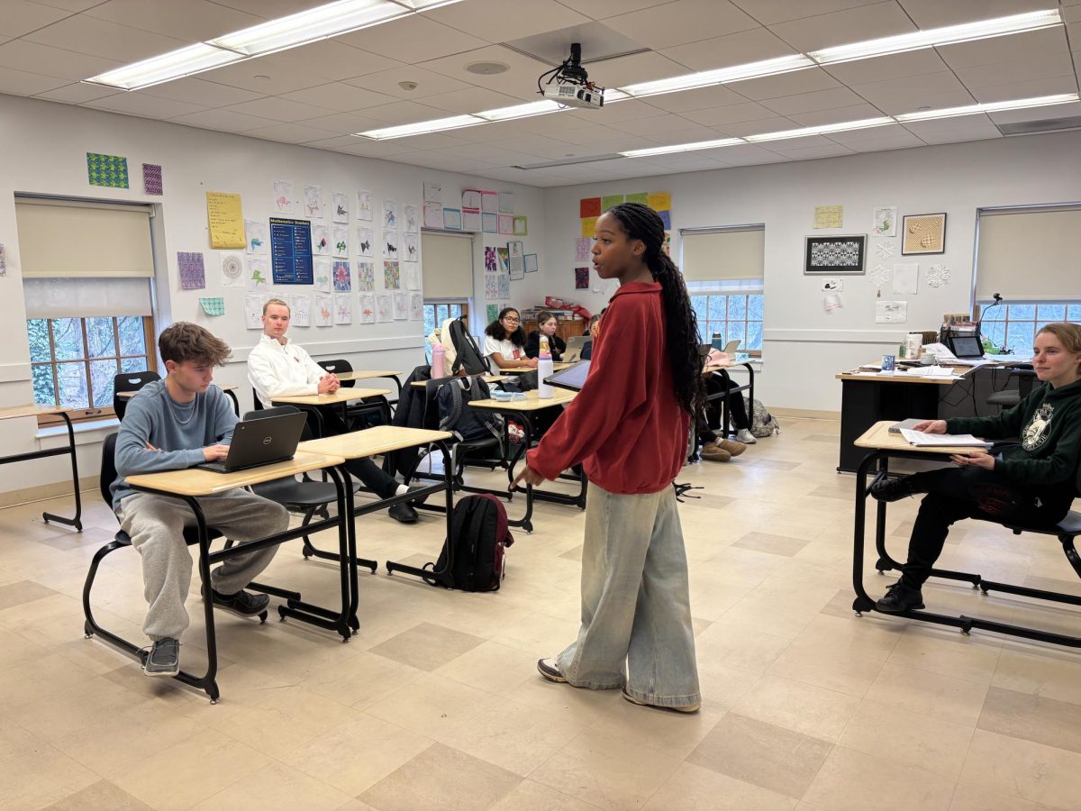 Olivia Arzu ’27 teaching the Mock Trial Class in preparation for their competitions. Photo by Natalie Choi ’27.
