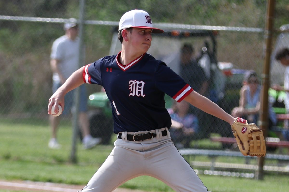 Benjamin Buchdal ’26 pitches a baseball at a game in 2024. Photo from MFS SmugMug.